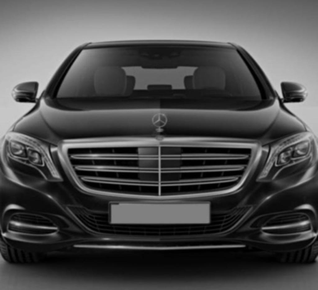 Front view of a black luxury Mercedes-Benz sedan