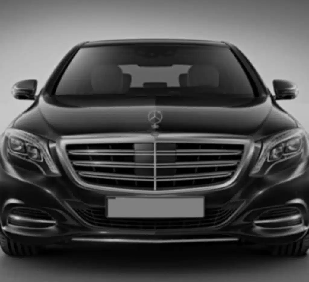 Front view of a black luxury Mercedes-Benz sedan